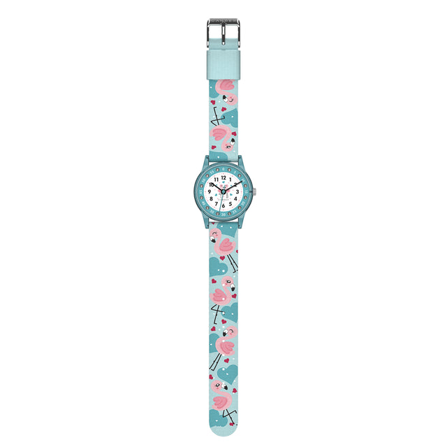 Eine Kinder-Armbanduhr mit einem türkisem Stoffarmband, auf dem super süße Flamingos abgebildet sind. Das türkis-transparentem Gehäuse hat ein Glitzereffekt. Auf dem Ziffernblatt befinden sich kleine Schmucksteine. Die Zahlen auf dem türkis- weißem Ziffernblatt sind sehr gut ablesbar.